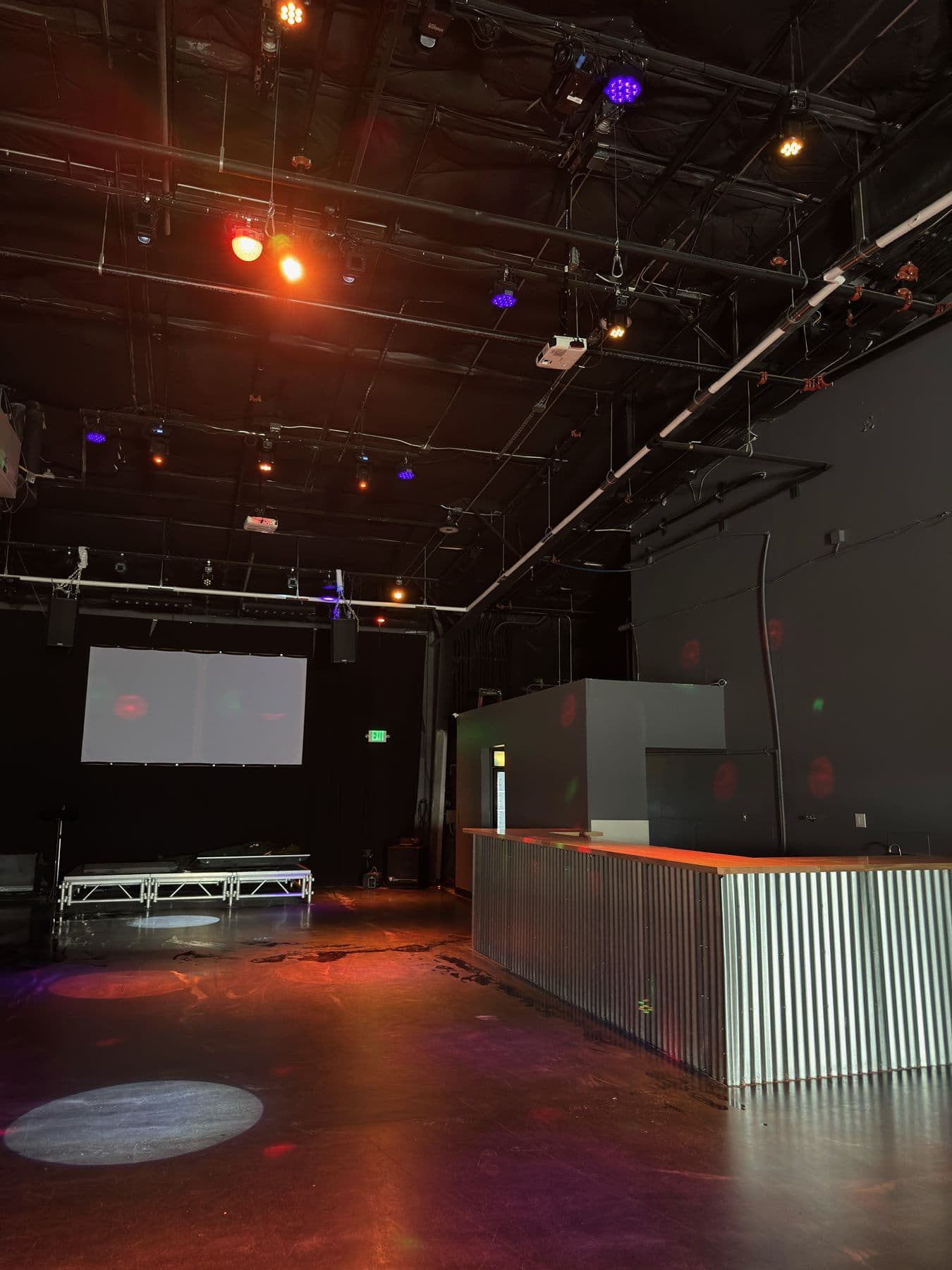 The Studio (NoBo) event space under stage lighting